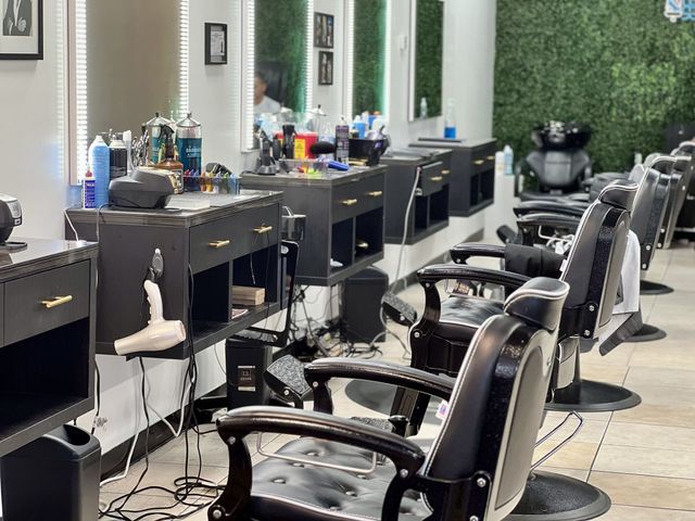 Row of barber chairs at Carlis Barbershop