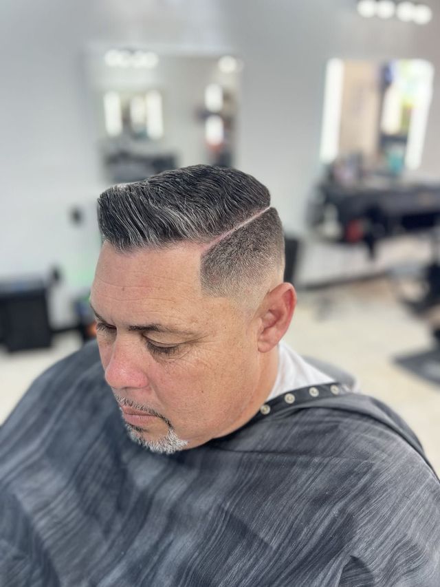 Taper haircut at Carlis Barbershop