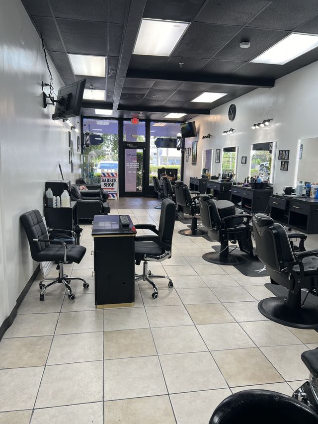 Barber chairs and station at Carlis Barbershop